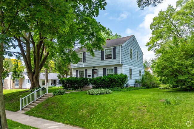 A colonial home in Nash Park with a great sidewalk entry.