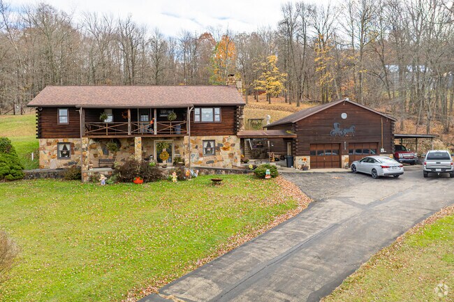 This ranch-style home in Georges Township sits among wooded landscapes.