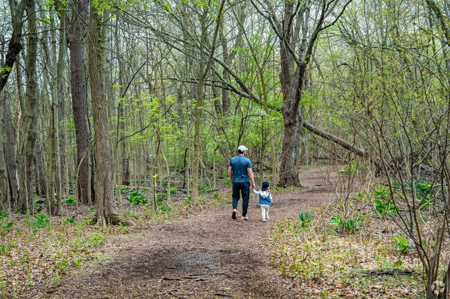 A father and daughter enjoy the walking trails in The Celery Farm in Allendale.