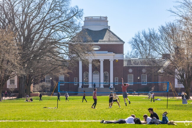 Students at University of Delaware spend time outside on a nice early spring day.