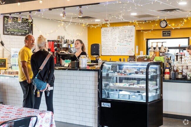 Early birds can go through the drive-thru at Milk & Honey Coffee Company in Highland Crest.