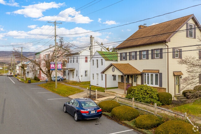 Colonial revivals in Bethel have symmetrical features with updated bay windows.