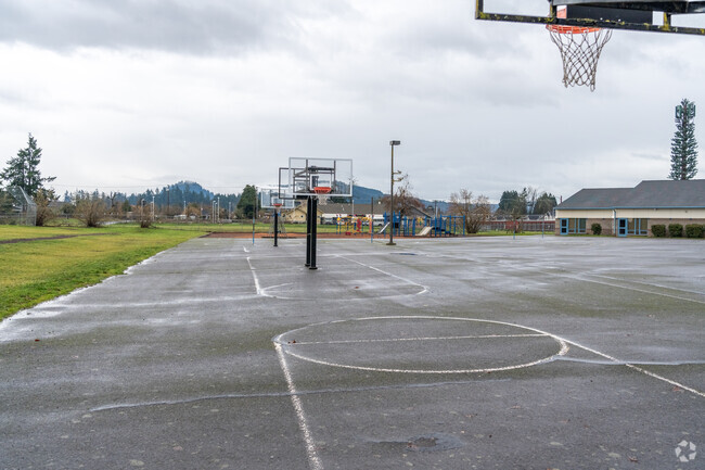 Mt Vernon Elementary School has outdoor basketball courts for students in Springfield, Oregon.
