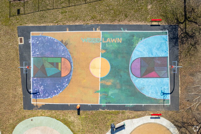 Woodlawn Park residents can enjoy a colorful basketball court centrally located.