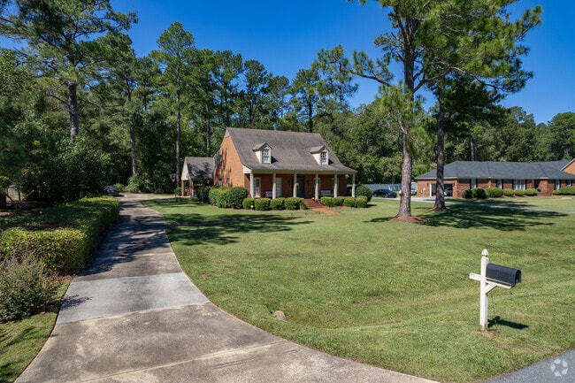 Homes in Saint Andrews sit on large manicured lots.