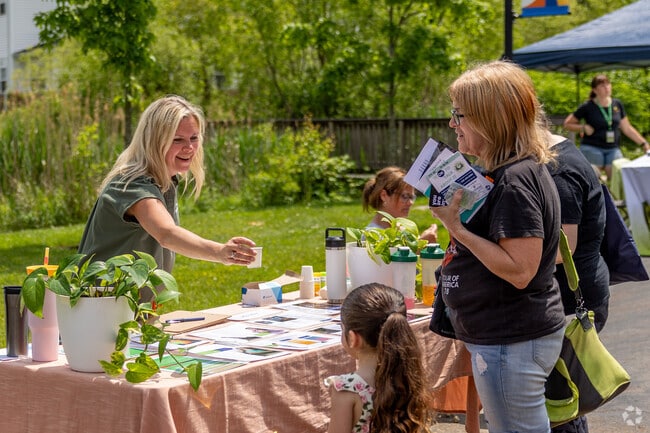 Residents of Green enjoy a day at Central Park where they can explore local businesses.