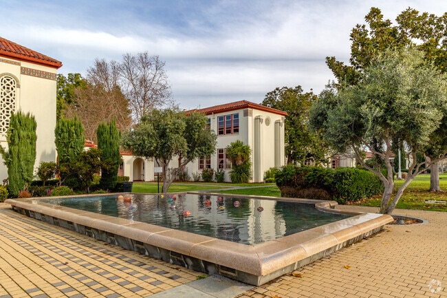 The campus of Delphi Academy Of Campbell includes a beautiful fountain.