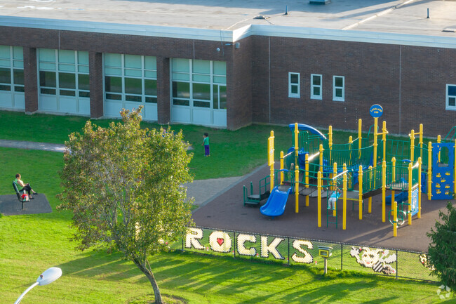 Benjamin Franklin Elementary School features a playground for students to enjoy.