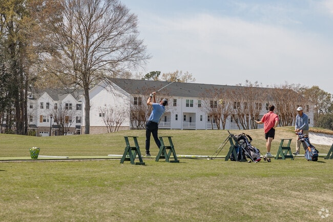 Play a round of golf with friends at The Golf Club At Wescott Plantation near Forest Hills.