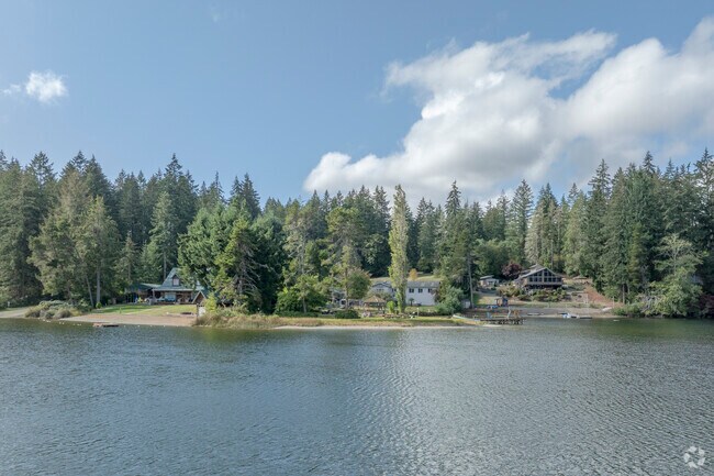 Stunning craftsmen and traditional homes sit on the water in Burley WA.