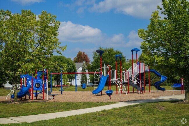 Children love the playground at Freedom Park, which offers safe, engaging equipment and open space for play.