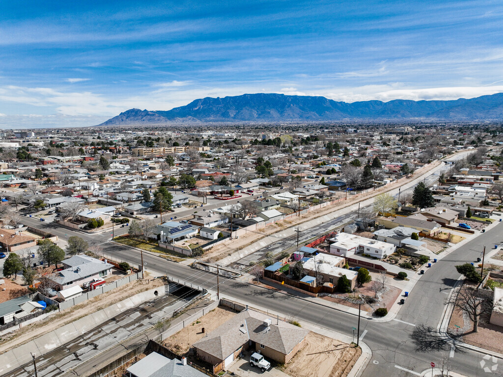 A stunning aerial view of Hodgin and the Paseo del Nordeste Recreation Trail along the arroy