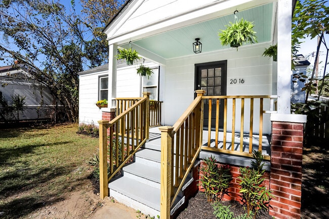Inviting front porch and off-street parking/driveway