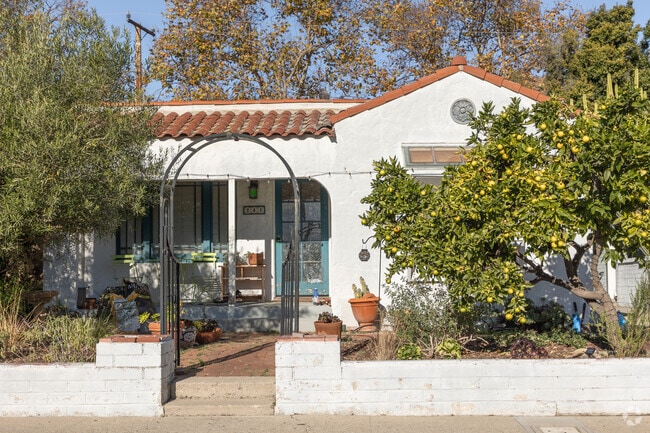 A Spanish-style home with a tiled roof in Westside.