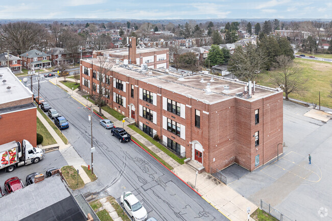 James Buchanan Elementary School fits well into its urban neighborhood.