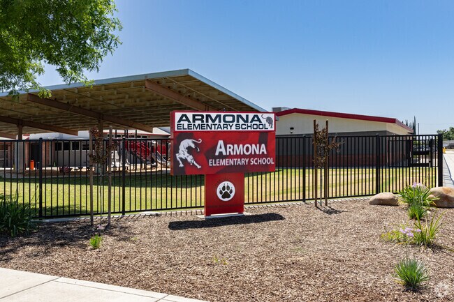 A lighted marquee at the entrance to Armona Elementary School informs parents of upcoming events.