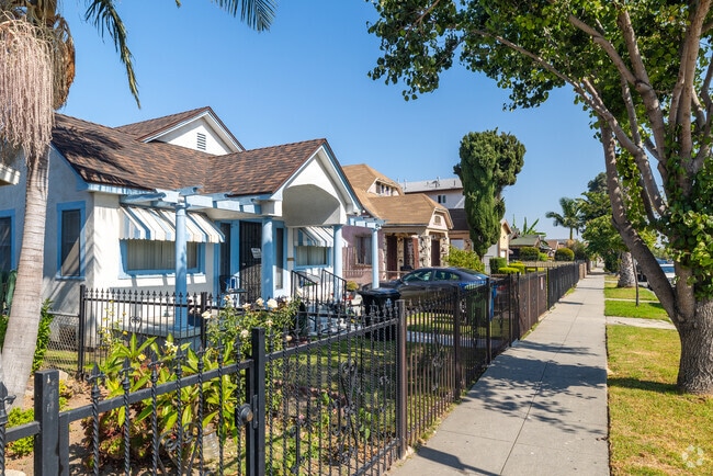 Admire the unique craftsman homes while walking the sunny streets of Florence, CA.