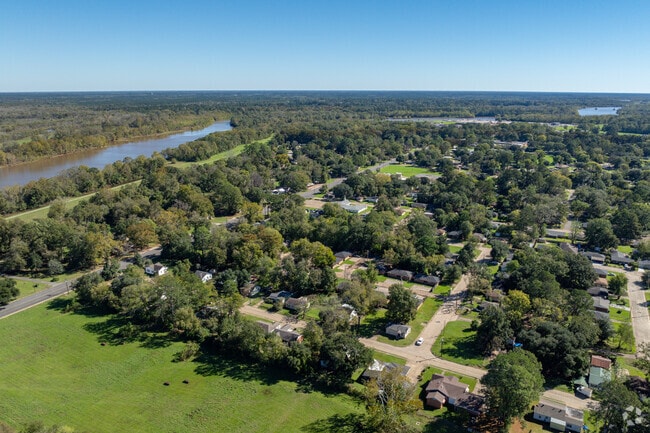 Acadian Village backs right up to the Red River.
