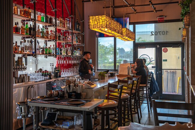 Grab a seat at the bar in La Fontana Ristorante and escape the Florida heat.