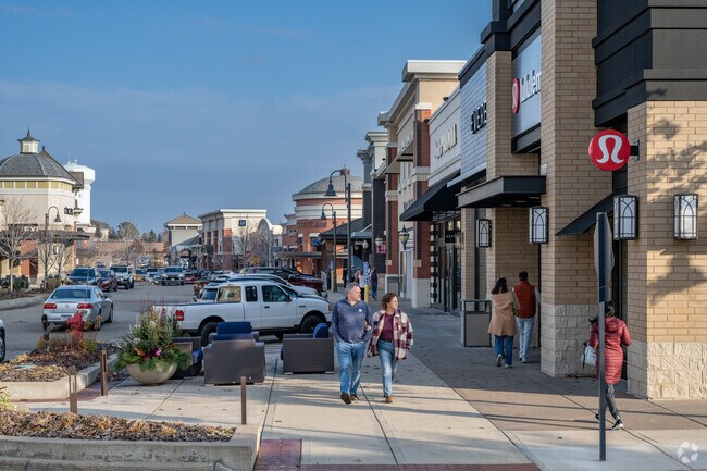 Woodbury residents enjoy window shopping at Woodbury Lakes outdoor shopping mall.