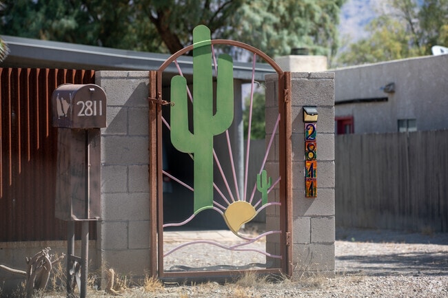 Saguaro cactus wrought iron gate in Rillito Bend.