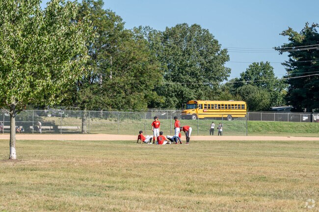 The teams are warming up at Bors Field in the Fairmont neighborhood.