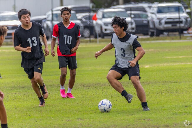 A player uses some fancy footwork to break the other team's defense at Blackstone Park.