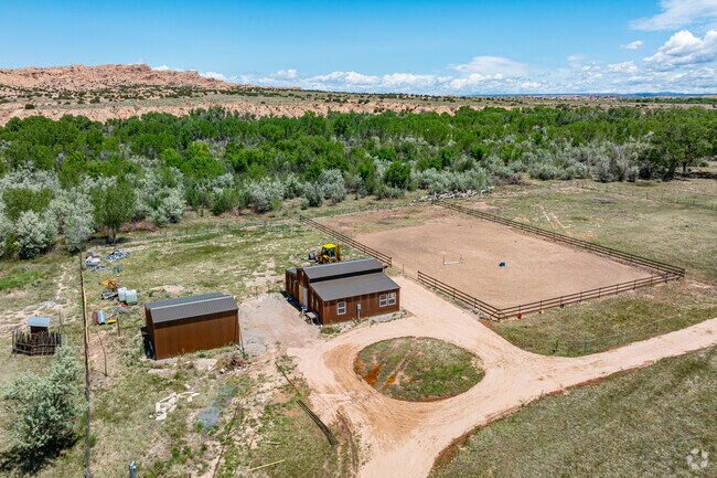 Acequia-fed fields and long-running farm practices remain part of Jacona.