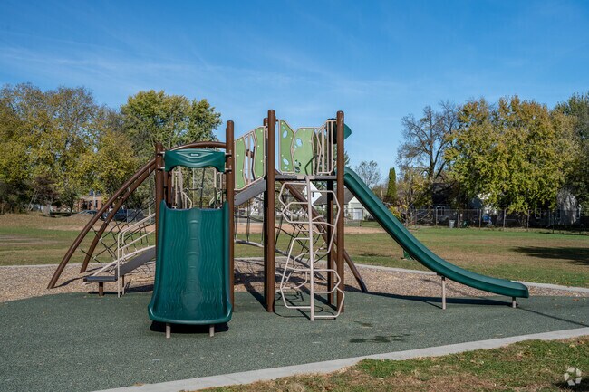 Families enjoy the playground at Newall Park.