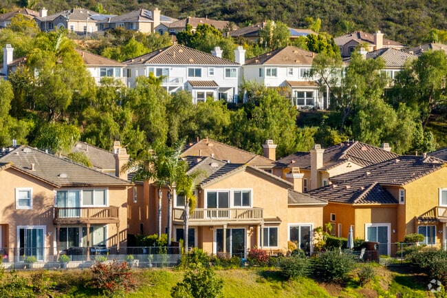 A row of two-story Spanish-inspired homes in Carmel Mountain.