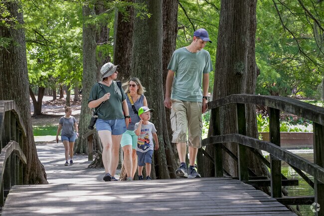The Swan Lake Iris Gardens features a one-mile loop trail around the lake.