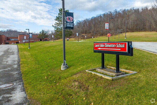 Laurel Valley Elementary School welcomes students with a large sign.