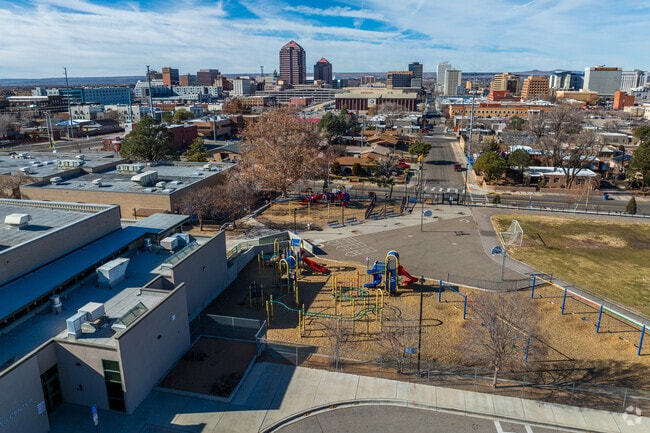 Longfellow Elementary School's playground with downtown Albuquerque in the distance.