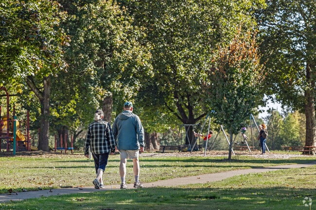 Village Green Park in Corvallis, OR has a flat, paved trail for sunset strolls.