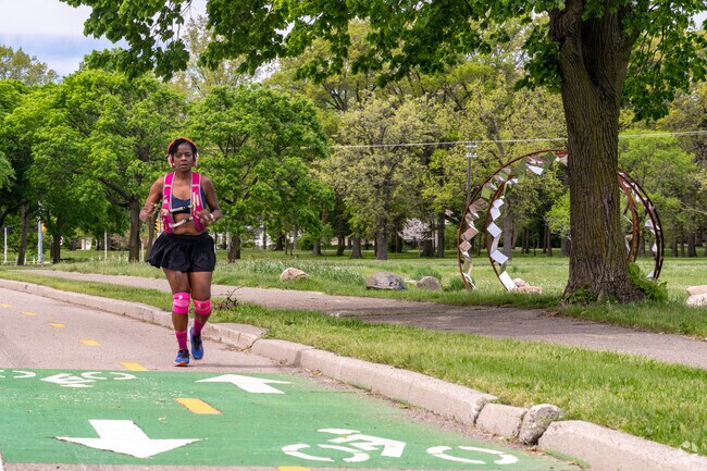 Palmer Park, next to Palmer Woods, provides a green getaway for walkers, runners, and bikers.