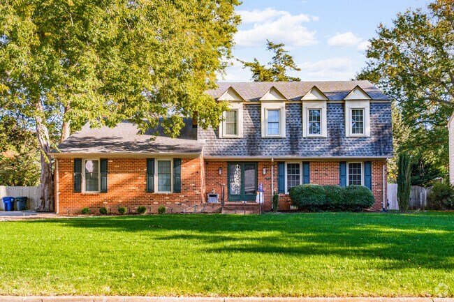 A beautiful split level home nestled in the serene Charles neighborhood.