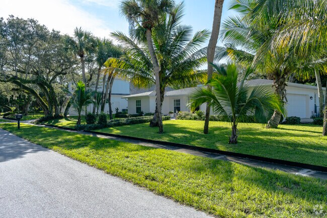 This row of Wabasso Beach homes enjoys the safety of neighborhood sidewalks.