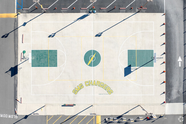 Look down at the basketball court at Saint Marianne de Paredes School in Pico Rivera, Ca.