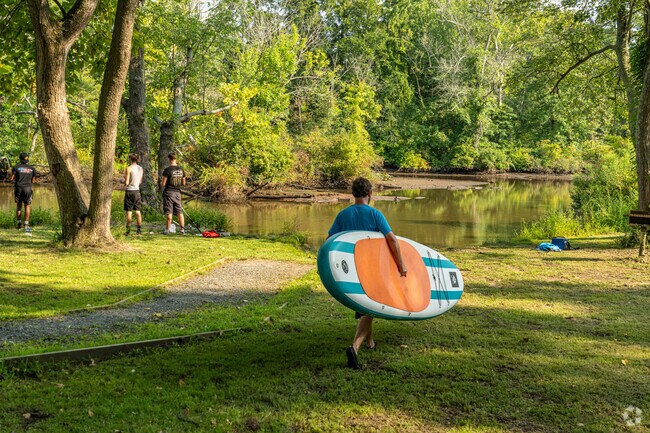 A paddleboarder makes his way to the banks of the Wicomico Creek at Douglas Nichols Park.