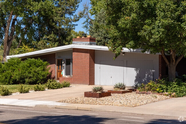 The curb appeal of this Arapahoe Acres home is off the charts.