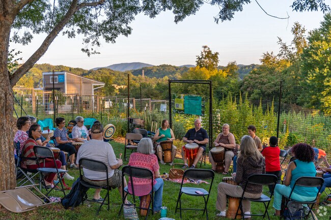 Join in the community drum circle outside of the urban garden in Morningside Park.