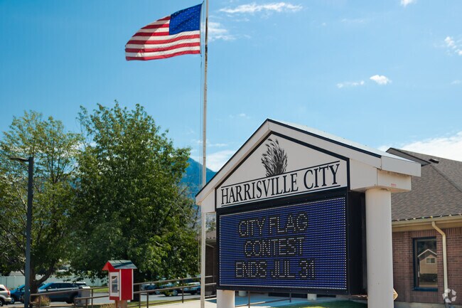 An American flag waves proudly in front of Harrisville City Hall.