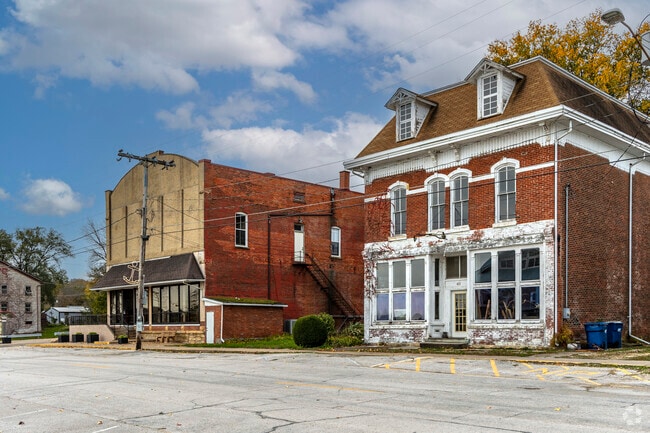 A couple of historic brick stone buildings with river views in Princeton.