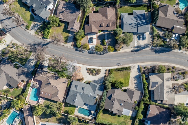 A bird's-eye view of Claremont's tree-lined streets, showcasing its residential charm.
