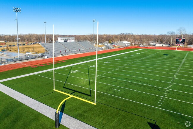Adel DeSoto Minburn High School football field offers ample space for games.