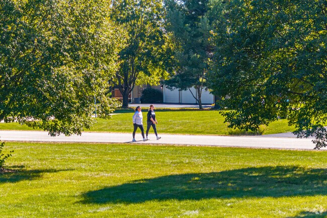 Mother & daughter enjoy a morning walk in the Cranston Meadows Park area of St. Charles, IL.