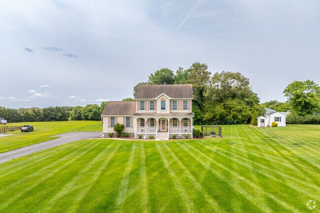 New Traditional homes in Willards sit on large lots with private driveways and garage parking.