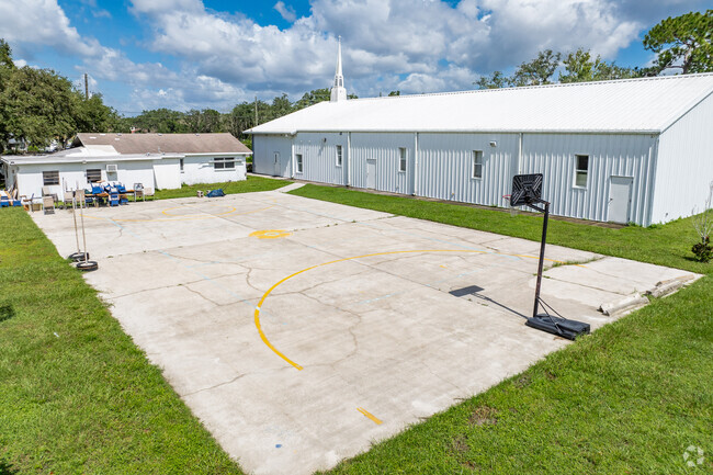 Kids enjoy outdoor play on the sports courts at Resurrection Christian School.