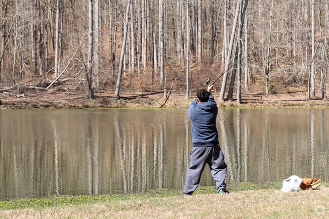 Anglers fish for trout at Lake Cosca in Cosca Regional Park, just minutes from Windbrook.