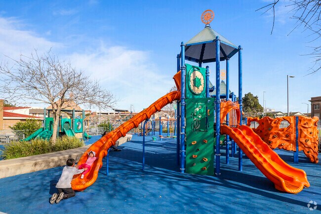 Laughter and play Children's paradise at Nevin Park, Iron Triangle.